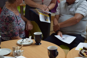 Image dipicting info sharing at a peer support event