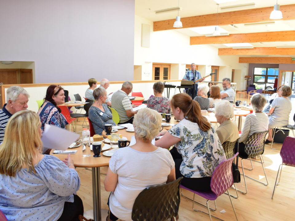 singer performing at De Cafe showing array of activities that take place